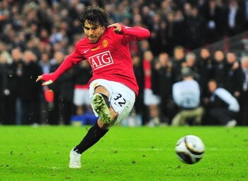 LONDON - MARCH 01:  Carlos Tevez of Manchester United scores a penalty in the shoot out during the Carling Cup Final match between Manchester United and Tottenham Hotspur at Wembley Stadium on March 1, 2009 in London, England.  (Photo by Mike Hewitt/Getty