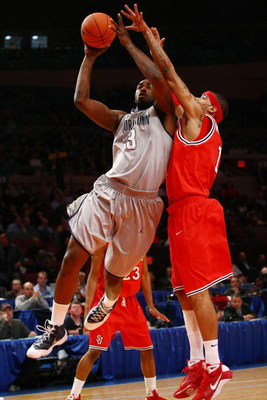 NEW YORK - MARCH 10: DaJuan Summers #3 of the Georgetown Hoyas goes to the hoop against D.J. Kennedy #1 of the St. John's Red Storm during the first round of the Big East Tournament at Madison Square Garden on March 10, 2009 in New York City. (Photo by