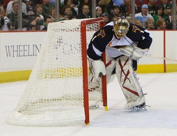 PITTSBURGH - MARCH 17: Johan Hedberg #1 of the Atlanta Thrashers puts the net back on its moorings in his game against the Pittsburgh Penguins on March 17, 2009 at the Mellon Arena in Pittsburgh, Pennsylvania.  (Photo by Bruce Bennett/Getty Images)