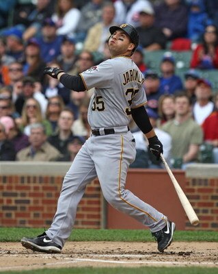 CHICAGO - MAY 27: Jason Jaramillo #35 of the Pittsburgh Pirates follows the flight of the ball against the Chicago Cubs on May 27, 2009 at Wrigley Field in Chicago, Illinois. The Cubs defeated the Pirates 5-2.  (Photo by Jonathan Daniel/Getty Images)