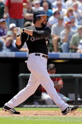 DENVER - MAY 14:  First baseman Todd Helton #17 of the Colorado Rockies takes an at bat against the Houston Astros during MLB action at Coors Field on May 14, 2009 in Denver, Colorado. The Astros defeated the Rockies 5-3.  (Photo by Doug Pensinger/Getty I