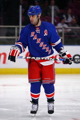 NEW YORK - MARCH 30: Scott Gomez #19 of the New York Rangers skates against the New Jersey Devils during the game on March 30, 2009 at Madison Square Garden in New York City.  (Photo by Chris McGrath/Getty Images)