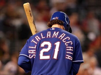 PHOENIX - JUNE 23:  Jarrod Saltalamacchia #21 of the Texas Rangers warms up on deck during the major league baseball game against the Arizona Diamondbacks at Chase Field on June 23, 2009 in Phoenix, Arizona. The Diamondbacks defeated the Rangers 8-2.  (Ph