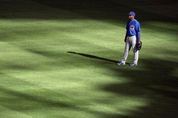 MILWAUKEE - APRIL 10: Milton Bradley #21 of the Chicago Cubs stands ready in the outfield against the Milwaukee Brewers during the Opening Day game on April 10, 2009 at Miller Park in Milwaukee, Wisconsin. (Photo by: Jonathan Daniel/Getty Images)