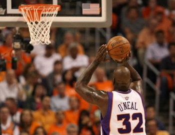PHOENIX - APRIL 25:  Shaquille O'Neal #32 of the Phoenix Suns shoots a free throw against the San Antonio Spurs during Game Three of the Western Conference Quarterfinals during the 2008 at NBA Playoffs at the U.S. Airways Center on April 25, 2008.  (Photo