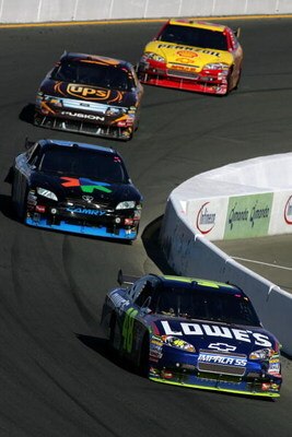 SONOMA, CA - JUNE 21: Jimmie Johnson, driver of the #48 Lowe's Chevrolet, leads Denny Hamlin, driver of the #11 FedEx Office Toyota, David Ragan, driver of the #6 UPS Ford, and Kevin Harvick, driver of the #29 Shell/Pennzoil Chevrolet, during the NASCAR S