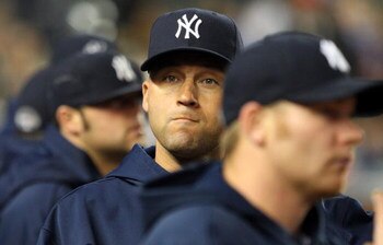 NEW YORK - JUNE 17:  An injured Derek Jeter #2 of the New York Yankees looks on from the dugout against the Washington Nationals on June 17, 2009 at Yankee Stadium in the Bronx borough of New York City. The Nationals defeated the Yankees 3-2.  (Photo by J