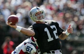 OAKLAND, CA - SEPTEMBER 19:  Quaterback Rich Gannon #12 of the Oakland Raiders passes the ball against the Buffalo Bills during the game at Network Associates Coliseum on September 19, 2004 in Oakland, California. The Raiders defeated the Bills 13-10. (Ph