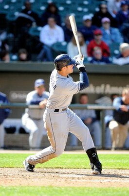 BALTIMORE - APRIL 12:  Evan Longoria #3 of the Tampa Bay Rays hits a home run in the eighth inning against the Baltimore Orioles on April 12, 2009 in Baltimore, Maryland.  (Photo by Greg Fiume/Getty Images)