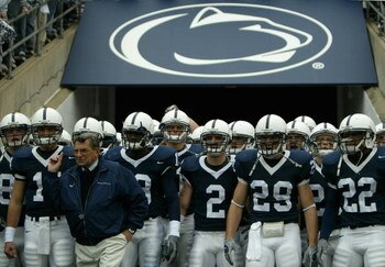 STATE COLLEGE, PA - OCTOBER 23:  Head coach Joe Paterno of the Penn State Nittnay Lions leads his team onto the field as the Iowa Hawkeyes defeated Penn State Nittnay Lions 6-4 during NCAA football at Beaver Stadium on October 23, 2004 in State College, P