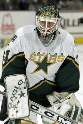 DENVER - APRIL 17:  Goaltender Ron Tugnutt #31 of the Dallas Stars warms up for game five of the Stanley Cup playoffs against the Colorado Avalanche at the Pepsi Center on April 17, 2004 in Denver, Colorado.  The Avalanche won 5-1.  (Photo by Brian Bahr/G