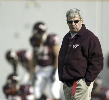 BLACKSBURG, VA - NOVEMBER 27:  Head coach Frank Beamer of the Virginia Tech Hokies watches his team warm up before a game against the Virginia Cavaliers on November 27, 2004, at Lane Stadium in Blacksburg, Virginia. Virginia Tech defeated Virginia 24-10. 