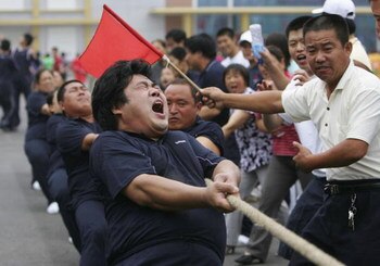 BEIJING - JULY 08:  Chinese people in a Tug-of-War match at the Farmers Game, part of the 4th 'Beijing 2008' Olympic Cultural Festival on July 8, 2006 in Beijing, China. (Photo by Cancan Chu/Getty Images)