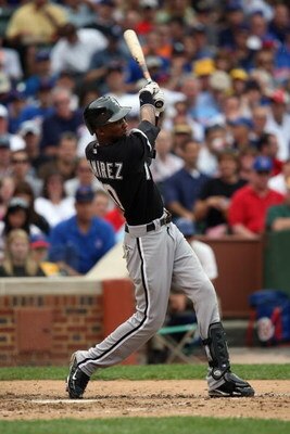 CHICAGO - JUNE 18:  Alexei Ramirez #10 of the Chicago White Sox bats against the Chicago Cubs during the game on June 18, 2009 at Wrigley Field in Chicago, Illinois. (Photo by Jonathan Daniel/Getty Images)