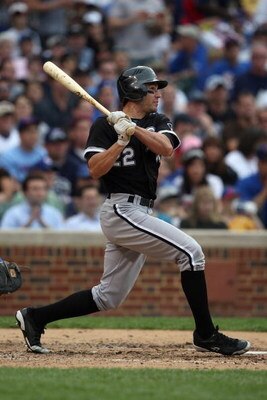 CHICAGO - JUNE 18:  Scott Podsednik #22 of the Chicago White Sox bats against the Chicago Cubs during the game on June 18, 2009 at Wrigley Field in Chicago, Illinois. (Photo by Jonathan Daniel/Getty Images)