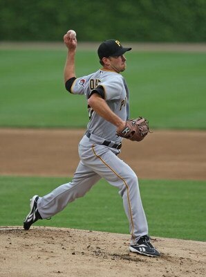 CHICAGO - MAY 27: Starting pitcher Zach Duke #57 of the Pittsburgh Pirates delivers the ball against the Chicago Cubs on May 27, 2009 at Wrigley Field in Chicago, Illinois. The Cubs defeated the Pirates 5-2.  (Photo by Jonathan Daniel/Getty Images)