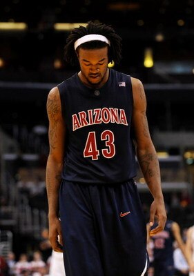 LOS ANGELES, CA - MARCH 12:  Forward Jordan Hill #43 of the Arizona Wildcats walks on the court during the final moments of their 68-56 loss to the Arizona State Sun Devils during the Pacific Life Pac-10 Men's Basketball Tournament at the Staples Center o