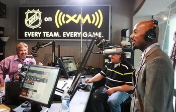 NEW YORK - JUNE 19:  Actor Romany Malco of 'The Love Guru'  is interviewed during XM's NHL live radio show as Romany visits the NHL Powered by Reebok store June 19, 2008 in New York City. Malco plays the Toronto Maple Leafs star hockey player in the Mike 