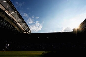 WIMBLEDON, ENGLAND - JUNE 26:  A general view of Centre Court as Novak Djokovic of Serbia serves during the men's singles third round match against Mardy Fish of USA on Day Five of the Wimbledon Lawn Tennis Championships at the All England Lawn Tennis and