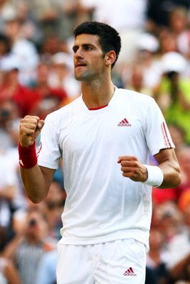 WIMBLEDON, ENGLAND - JUNE 26:  Novak Djokovic of Serbia celebrates victory during the men's singles third round match against Mardy Fish of USA on Day Five of the Wimbledon Lawn Tennis Championships at the All England Lawn Tennis and Croquet Club on June 