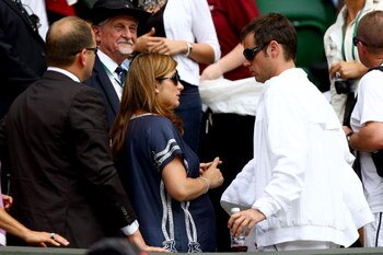 WIMBLEDON, ENGLAND - JUNE 26:  Mirka Federer, wife of Roger Federer of Switzerland leaves her seat after his men's singles third round match against Philipp Kohlschreiber of Germany on Day Five of the Wimbledon Lawn Tennis Championships at the All England