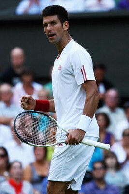 WIMBLEDON, ENGLAND - JUNE 26:  Novak Djokovic of Serbia reacts during the men's singles third round match against Mardy Fish of USA on Day Five of the Wimbledon Lawn Tennis Championships at the All England Lawn Tennis and Croquet Club on June 26, 2009 in 