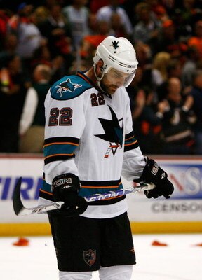 ANAHEIM, CA - APRIL 27:  Dan Boyle #22 of the San Jose Sharks stands on the ice after the Sharks were eliminated from the playoffs by the Anaheim Ducks during Game Six of the Western Conference Quarterfinal Round of the 2009 Stanley Cup Playoffs at the Ho