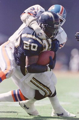 24 Sep 1995: DENVER SAFETY STEVE ATWATER, #27, TACKLES SAN DIEGO RUNNING BACK NATRONE MEANS DURING THE SECOND QUARTER OF THE CHARGERS GAME VERSUS BRONCOS AT JACK MURPHY STADIUM IN SAN DIEGO, CALIFORNIA.