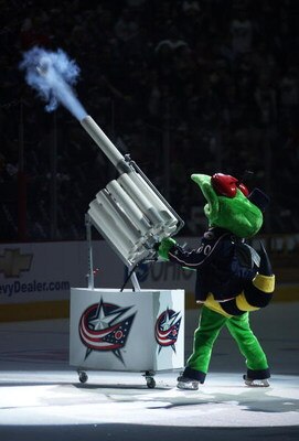 COLUMBUS, OHIO - APRIL 23:  Stinger, the Mascot of the Columbus Blue Jackets fires a tee shirt into the crowd prior to game against the Detroit Red Wings during Game Four of the Western Conference Quarterfinals of the 2009 Stanley Cup Playoffs on April 23