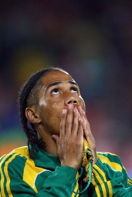 JOHANNESBURG, SOUTH AFRICA - JUNE 25:  Steven Pienaar of South Africa looks to the heavens prior to the FIFA Confederations Cup Semi Final match beween Brazil and South Africa at Ellis Park on June 25, 2009 in Johannesburg, South Africa.  (Photo by Alex L