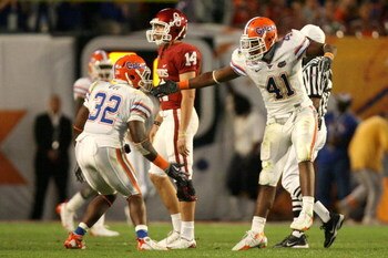 MIAMI - JANUARY 08:  Sam Bradford #14 of the Oklahoma Sooners look to pass against the Florida Gators during the FedEx BCS National Championship game at Dolphin Stadium on January 8, 2009 in Miami, Florida.  (Photo by Marc Serota/Getty Images)