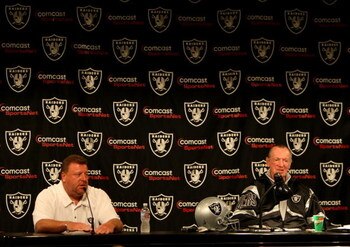 ALAMEDA, CA - SEPTEMBER 30: Oakland Raiders owner Al Davis and Tom Cable speak during a press conference after being named new head coach after the firing of Lane Kiffin of the Oakland Raiders at thier training facility on Septemer 30, 2008 in Alameda, Ca