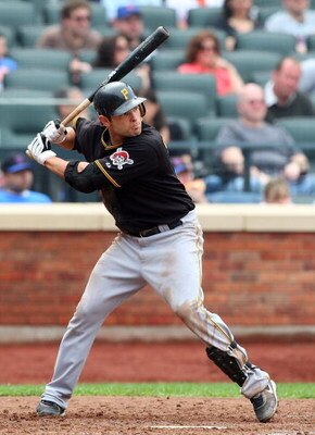 NEW YORK - MAY 09:  Freddy Sanchez #12 of the Pittsburgh Pirates bats against the New York Mets on May 9, 2009 at Citi Field in the Flushing neighborhood of the Queens borough of New York City. The Mets defeated the Pirates 10-1.  (Photo by Jim McIsaac/Ge