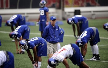 EAST RUTHERFORD, NJ - MAY 09: Tom Coughlin, head coach of the New York Giants walks on the field at rookie camp on May 9, 2009 in East Rutherford, New Jersey.  (Photo by Jeff Zelevansky/Getty Images)