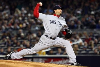 NEW YORK - MAY 05:  Josh Beckett #19 of the Boston Red Sox delivers a pitch against the New York Yankees on May 5, 2009 at Yankee Stadium in the Bronx borough of New York City. The Red Sox defeated the Yankees 7-3.  (Photo by Jim McIsaac/Getty Images)