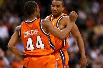 WINSTON-SALEM, NC - MARCH 03:  Teammates J.R. Reynolds #2 and Sean Singletary #44 of the Virginia Cavaliers celebrate after a basket against the Wake Forest Demon Deacons on March 3, 2007 at Lawrence Joel Coliseum in Winston Salem, North Carolina.  (Photo