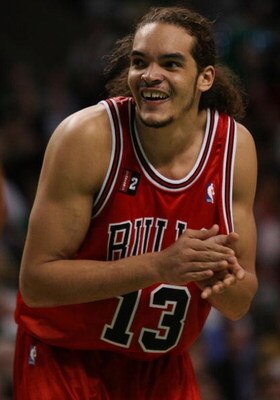 BOSTON - MAY 02:  Joakim Noah #13 of the Chicago Bulls reacts as the Boston Celtics fans yell at him in Game Seven of the Eastern Conference Quarterfinals during the 2009 NBA Playoffs at TD Banknorth Garden on May 2, 2009 in Boston, Massachusetts. The Cel