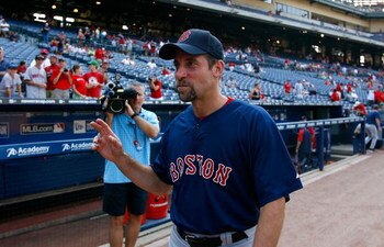 ATLANTA - JUNE 26:  Pitcher John Smoltz #29 of the Boston Red Sox waves to the fans during pregame warmups before facing the Atlanta Braves at Turner Field on June 26, 2009 in Atlanta, Georgia.  (Photo by Kevin C. Cox/Getty Images)