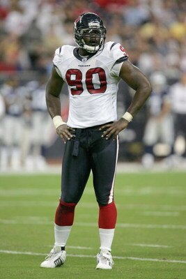 HOUSTON - AUGUST 25: Mario Williams #90 of the Houston Texans stands on the field during the game against the Dallas Cowboys at Reliant Stadium on August 25, 2007 in Houston, Texas. (Photo by Ronald Martinez/Getty Images)