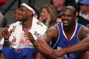 DENVER - FEBRUARY 20:   (L-R) LeBron James #23 and Shaquille O'Neal #32 of the Eastern Conference All-Stars smile on the bench in the final moments of the East's win over the Western Conference All-Stars the 54th All-Star Game, part of 2005 NBA All-Star W
