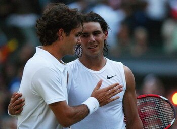 LONDON - JULY 06:  Roger Federer of Switzerland congratulates Rafael Nadal of Spain in winning match point and the Championship during the men's singles Final on day thirteen of the Wimbledon Lawn Tennis Championships at the All England Lawn Tennis and Cr