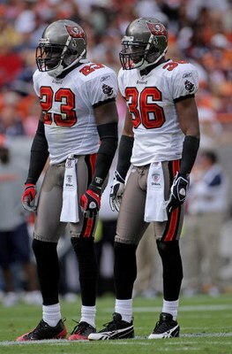 DENVER - OCTOBER 05:  Jermaine Phillips #23 and Tanard Jackson #36 of the Tampa Bay Buccaneers await action against the Denver Broncos during NFL action on October 5, 2008 in Denver, Colorado. The Broncos defeated the Buccaneers 16-13.  (Photo by Doug Pen