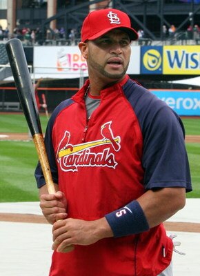 SAN FRANCISCO - MAY 31:  Albert Pujols #5 of the St. Louis Cardinals warms up in the dugout before he bats against the San Francisco Giants at AT&T Park on May 31, 2009 in San Francisco, California.  (Photo by Ezra Shaw/Getty Images)