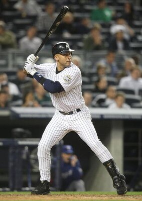 NEW YORK - JUNE 03:  Derek Jeter #2 of the New York Yankees bats against the Texas Rangers on June 3, 2009 at Yankee Stadium in the Bronx borough of New York City.  (Photo by Nick Laham/Getty Images)