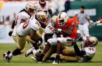 COLLEGE PARK, MD - NOVEMBER 22:  Chris Turner #10 of the Maryland Terrapins is sacked by Everette Brown #99 of the Florida State Seminoles on November 22, 2008 at Byrd Stadium in College Park, Maryland.  (Photo by Jim McIsaac/Getty Images)