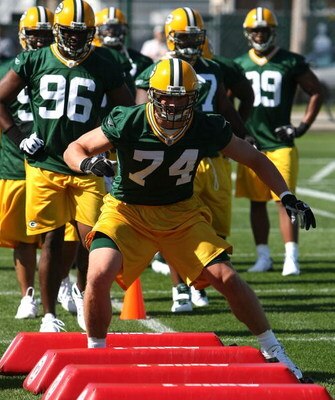 GREEN BAY, WI - JULY 28: Aaron Kampman #74 of the Green Bay Packers works out during summer training camp on July 28, 2008 at the Hutson Center in Green Bay, Wisconsin. (Photo by Jonathan Daniel/Getty Images)
