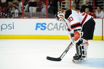 RALEIGH, NC - APRIL 21:  Goalie Martin Brodeur #30 of the New Jersey Devils reacts on the ice against the Carolina Hurricanes during Game Four of the Eastern Conference Quarterfinals of the 2009 Stanley Cup Playoffs on April 21, 2009 at the RBC Center in 