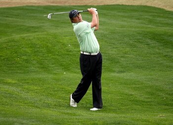 LA QUINTA, CA - JANUARY 23:  Jason Dufner hits his second shot on the ninth hole on the Nicklaus Private course of PGA West during the third round of the Bob Hope Chrysler Classic on January 23, 2009 in La Quinta, California.  (Photo by Stephen Dunn/Getty