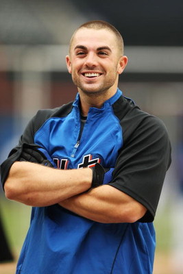 NEW YORK - JUNE 10: David Wright #5 of the New York Mets looks on during batting practice before the game against the Philadelphia Phillies during their game on June 10, 2009 at Citi Field in the Flushing neighborhood of the Queens borough of New York Ci