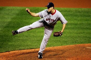 CLEVELAND - OCTOBER 18:  Closing pitcherJonathan Papelbon #58 of the Boston Red Sox delivers against the Cleveland Indians during Game Five of the American League Championship Series at Jacobs Field on October 18, 2007 in Cleveland, Ohio.  The Red Sox won